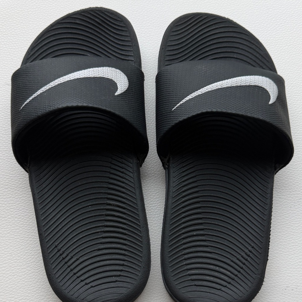 Black Slide Sandals with White Nike Logo boys size 13.5